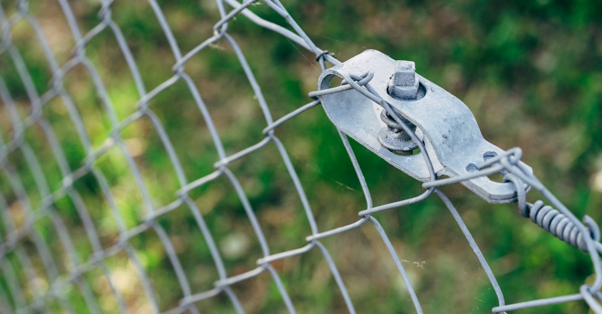 Best Practices for Repairing Metal Commercial Fencing
